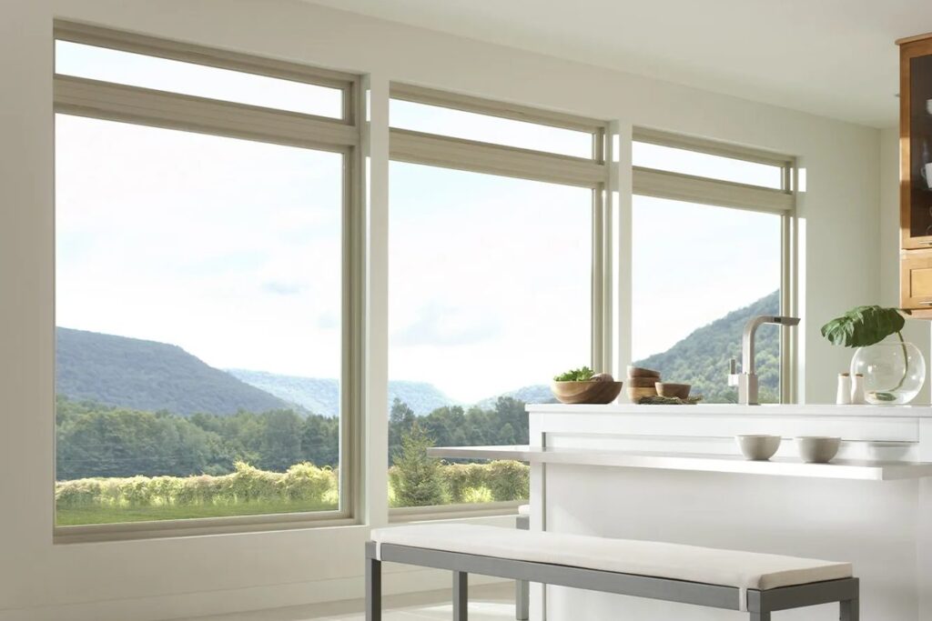 Large picture windows with a mountain view